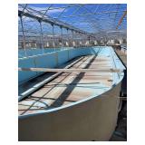 Used oval fiberglass aquaculture tank. Approximately 55’x16’x4’. Comes with two tank filtration system and center partition.