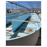 Used oval fiberglass aquaculture tank. Approximately 55’x16’x4’. Comes with two tank filtration system and center partition.
