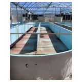 Used oval fiberglass aquaculture tank. Approximately 55’x16’x4’. Comes with two tank filtration system and center partition.
