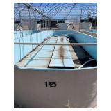 Used oval fiberglass aquaculture tank. Approximately 55’x16’x4’. Comes with two tank filtration system and center partition.