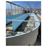 Used oval fiberglass aquaculture tank. Approximately 55’x16’x4’. Comes with two tank filtration system and center partition.