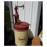 Shell stenciled oil barrel and pump. Brass