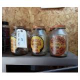 (8) Shell Motor oil jars with lids.
