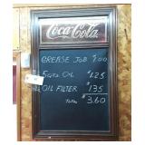 Wood framed Coca-Cola sign with blackboard.