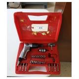 Universal Power air operated gun with attachments.