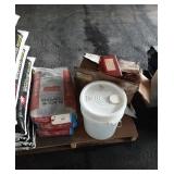 Lot of Black Diamond, box of small gas cans.