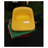 John Deere seat and tarps.