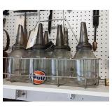 (8) oil jars with spouts and carry tray.