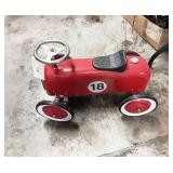 Race replica peddle car.