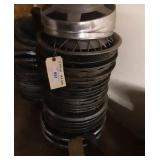 (2) stacks of hubcaps.