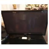 Samsung TV and stand.