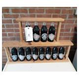 12 assorted Coke Bottles.