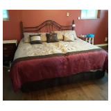 Bed with controls to raise and lower.  Dresser