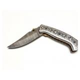 ORNATE FOLDING KNIFE- VERY HEAVY- VERY NICE