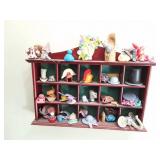MINIATURES ON WALL IN SHADOW BOX