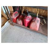 4- RED PLASTIC FUEL CANS