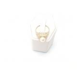 2.8g 18k wg ring with white bead on top;
