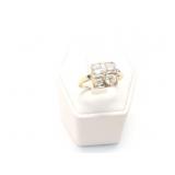 2.6g 14k yg ring with 4 small diamonds on top;