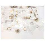 several white beads; silver toned bracelet with