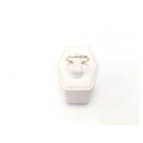 1.8g 14k wg ring with 3 small diamond chips;