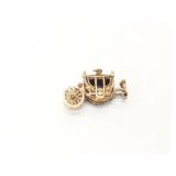 3.8g 9k yg horse carriage charm;