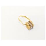 2.8g 18k yg bent ring with wg/yg box on top;