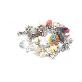 approx 100g .925 charm bracelet with several