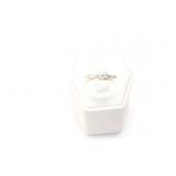 2.4g platinum ring with small center diamond;