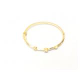 11.2g 14k bangle bracelet with 3 small diamonds;
