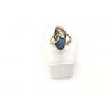 3.5g 14k yg ring with black center stone;