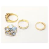 2.1g 14k yg ring with several diamond chips;
