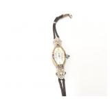 approx 5.9g platinum ladies wrist watch on black