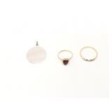 1.1g 10k yg ring with black heart shaped stone;
