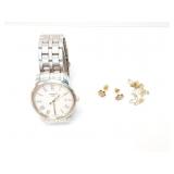 1.5g 14k yg pr earrings with 1 small diamond in