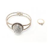 1.7g 14k yg ring with small diamond; silver toned