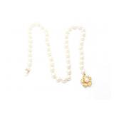 pearl necklace with a 3.5g 14k yg clasp;