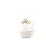 3.3g 14k wg ring with small pear shaped diamond;