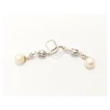 4.1g 14k wg pr earring with small diamonds and 1