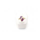 2.9g 10k yg ring with 2 purple stones;