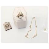 1.5g 14k yg bracelet with 4 white beads; 7.3g