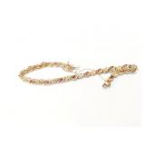 9.3g 10k yg bracelet with pink stones;