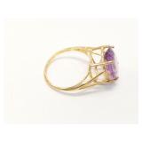 2.7g 10k yg ring with large oval shaped purple