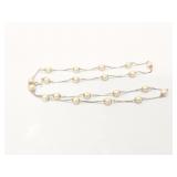 approx 14.5g 18k wg necklace with several pearls;