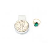 2.3g 10k yg ring with large green center stone;