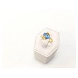 2.5g 14k yg ring with blue center stone;