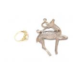 2.1g 10k yg ring with 2 oval shaped white stones;