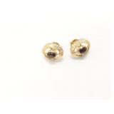 4.2g 18k yg pr earrings with 1 small brown stone