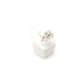 3.8g 14k wg ring with diamond chips and 1 small