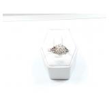 2g 18k white gold ring with several diamond chips