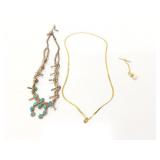 31.8g .925 necklace with several blue beads; 0.9g